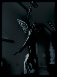 a statue of a cherub